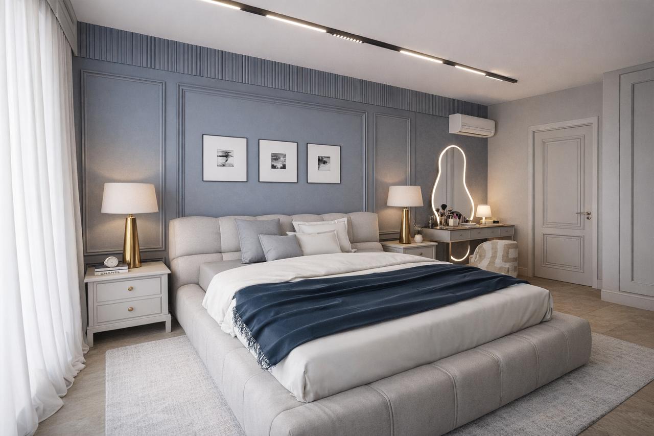 Cabecera con boiserie azul, cama tapizada y espejo iluminado — PH Pacific Blue