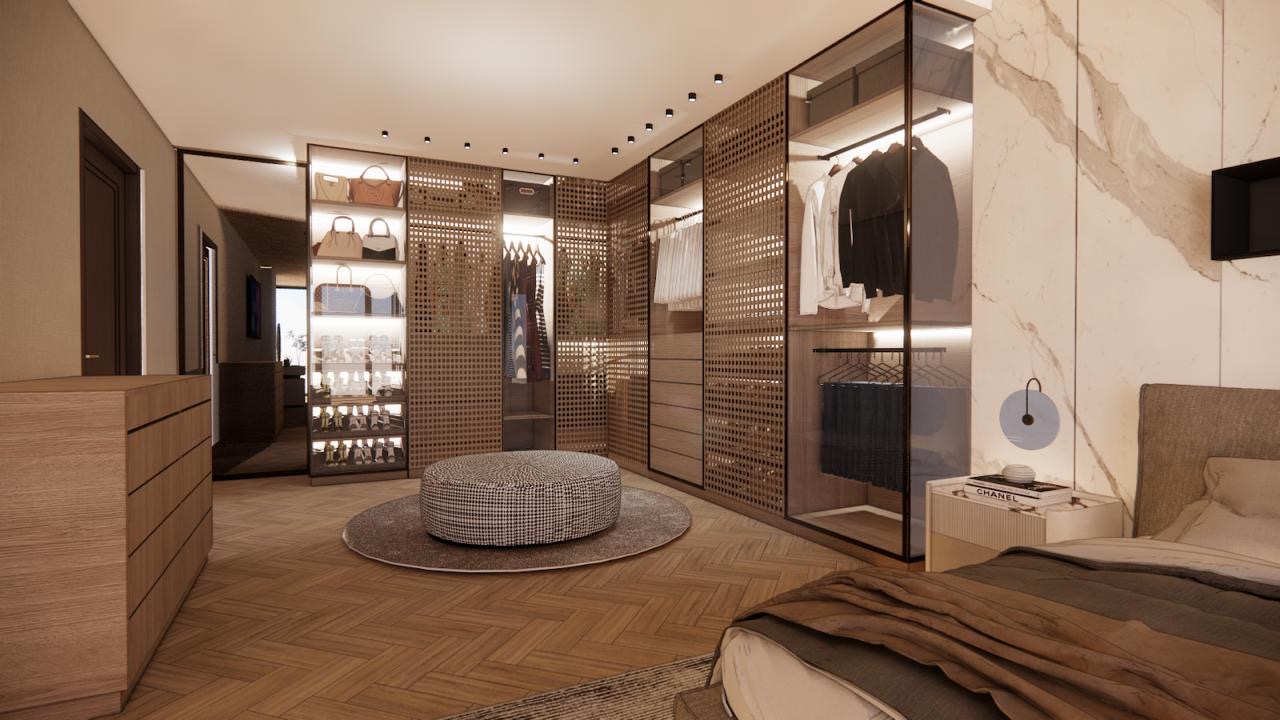 Vista general del walking closet con isla de cajones y vitrinas — Santa Maria
