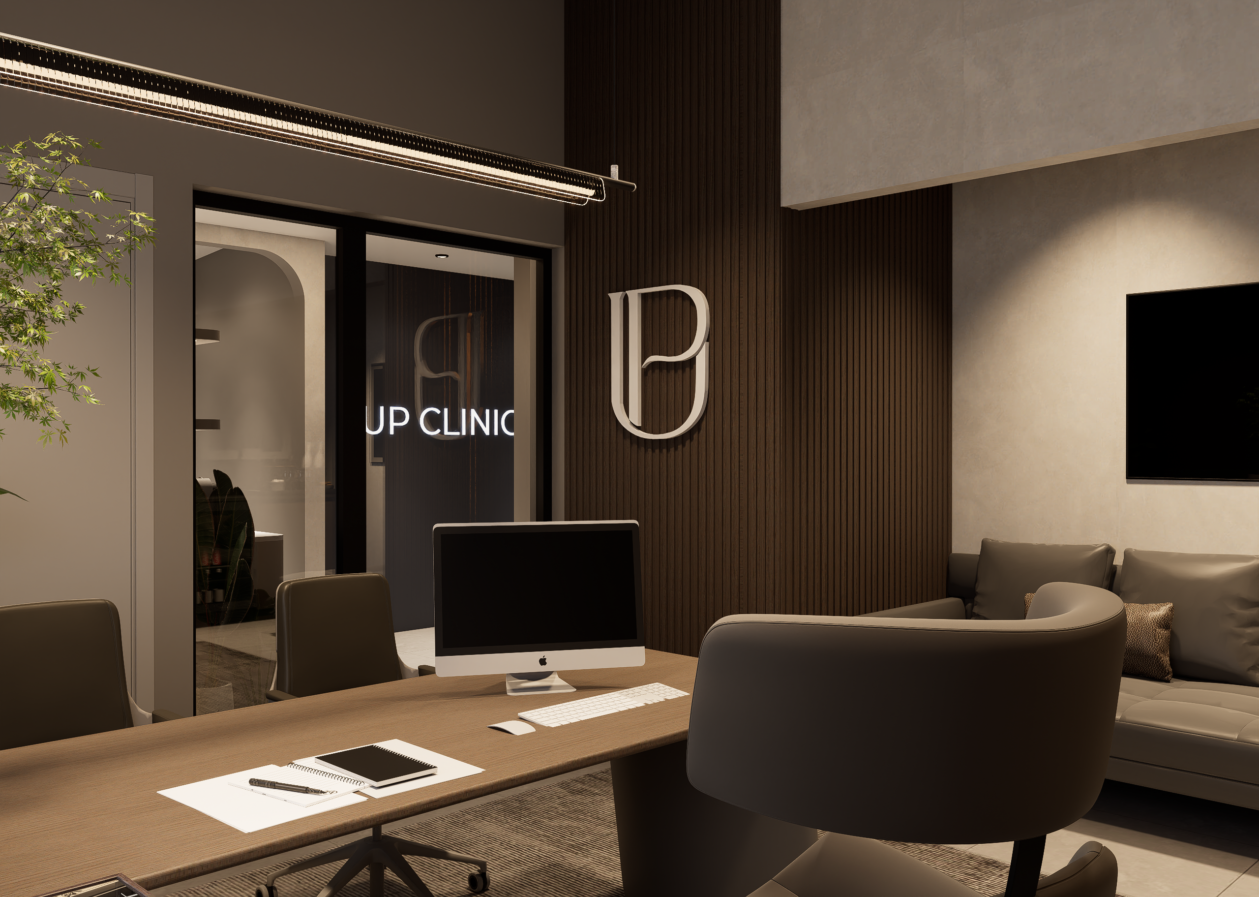 Oficina con vista hacia la recepción y logotipo Up Clinic — Up Clinic